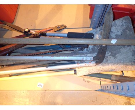 Selection of gardening tools rake spade shears etc