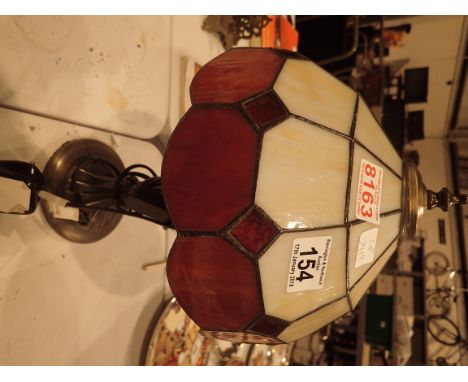 Tiffany style lamp with red and cream shade