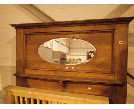 Light oak mantlepiece with fitted bevelled mirror