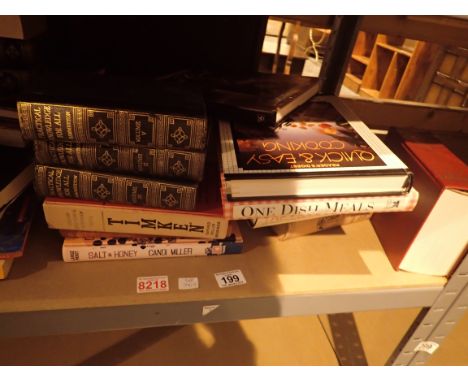Shelf of assorted fact and fiction soft and hardback books