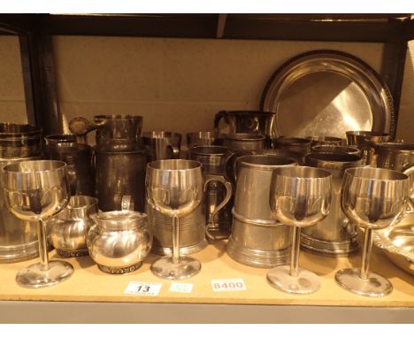 Shelf of mixed tankards goblets trays plate etc