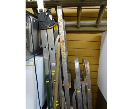 Parcel of various stepladders including a two section wooden ladder etc