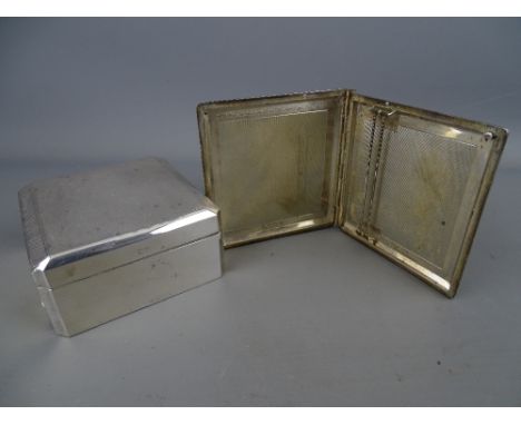 Chester 1929 silver cigarette box and a silver cigarette case with slide-open action, Birmingham hallmark, both have engine t