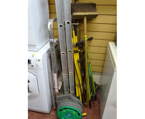 Parcel of long handled garden tools, metal stepladder and one other multi-way ladder