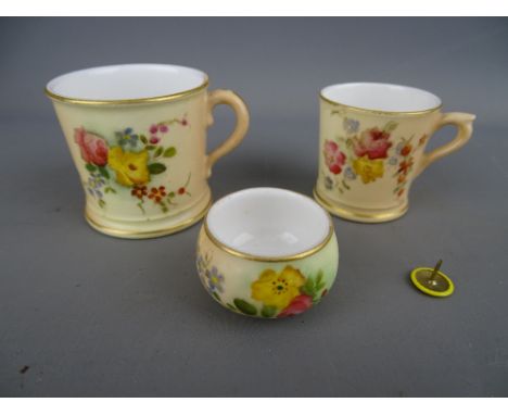 Two Royal Worcester miniature blush decorated cabinet cups with a small unmarked similarly decorated bowl