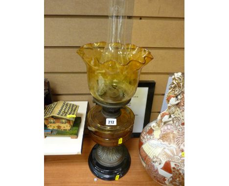 Brass column oil lamp with amber glass reservoir and etched glass shade