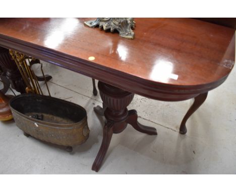 A reproduction console table having lift top (no support?)
