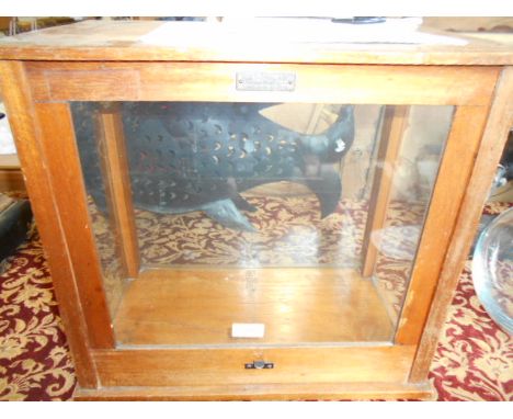 A glazed mahogany Apothecary scales cabinet with sliding doors to front