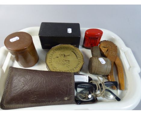 A Tray of Curios to Post office Money Box, Wooden Nut Crackers, Interesting Etched Copper Lidded Circular Canister   