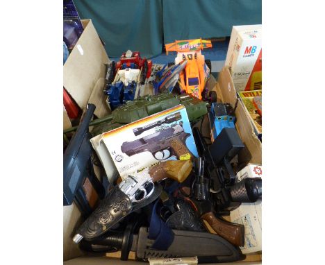 A Box Containing Various Toys to Include Tanks, Guns, Robot, Thomas the Tank Etc