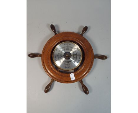 A Modern Aneroid Wall Barometer in the Form of a Ships Wheel, 30cm Diameter