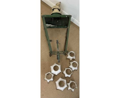 A Victorian metal lantern frame (af), height 88cm from top of finial, also seven opaline glass tulip shades.