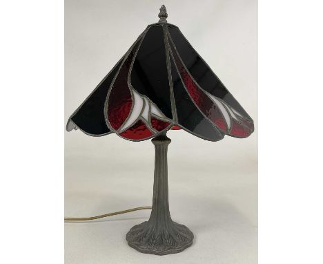 A Tiffany style red and black glass table lamp on bronzed metal base, height 49cm.Condition Report: Fitting of shade to base 