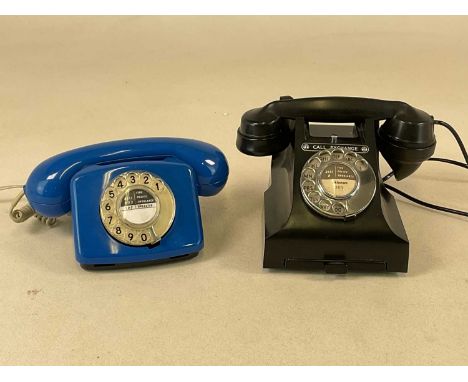 A black GPO 312L telephone with pullout drawer, and a blue rotary model 776 EET telephone (2).