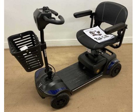 RASCAL VIE; an as new mobility scooter, complete with charging pack, owner's manual, and service record, and with two keys.Co