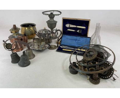A quantity of metalware, to include oil lamps, silver plated flatware and other copper and brass items.