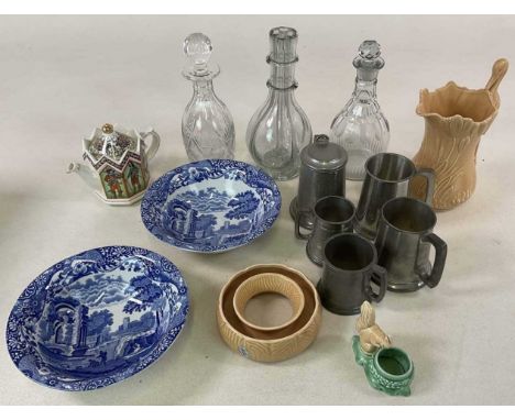 A group of collectors' items comprising ceramics, glass decanters, pewter including decanters, a European oil bottle dispense
