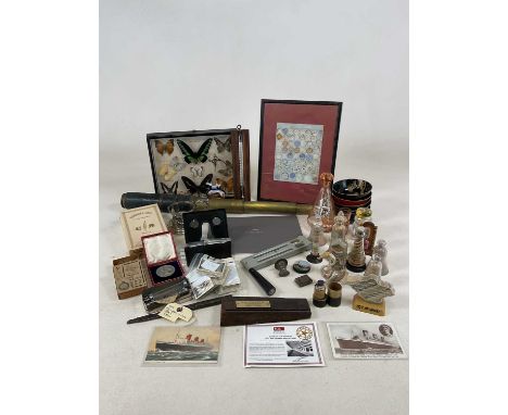 A quantity of collectors' items, including a brass three draw telescope, RMS Olympic decking section, Lord Baden Powell match