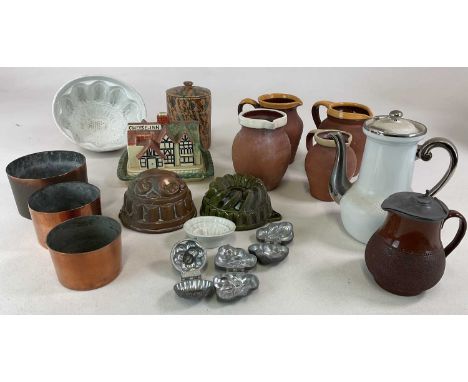 A collection of kitchenalia including jelly and chocolate moulds, pottery jugs and other items.Condition Report: Some jugs an