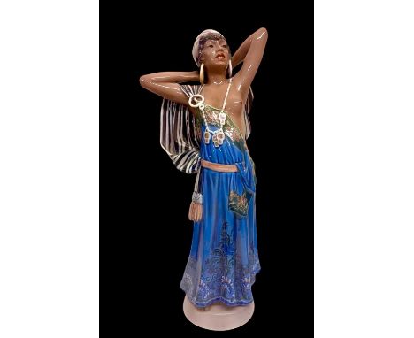DAHL JENSEN FOR COPENHAGEN; a porcelain figure of Arabian girl, model 1129, height 42.5cm.Condition Report: This item has a s