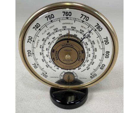 JAEGER; a cylindrical perspex barometer, with subsidiary thermometer dial to the lower section, height 18.5cm.Condition Repor