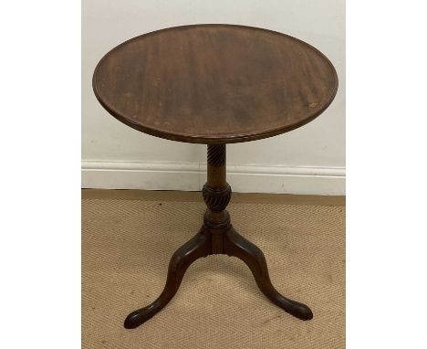 A 20th century mahogany circular tripod table, height 68cm.