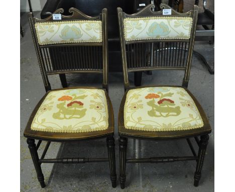 A pair of Edwardian mahogany inlaid bedroom chairs with Art Nouveau organic upholstery. (2)(B.P. 21% + VAT)