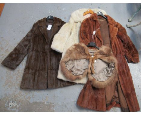 Three vintage fur coats; one cream rabbit fur, two brown squirrel fur coats and a 1940's fox fur stole. (4) (B.P. 21% + VAT)d