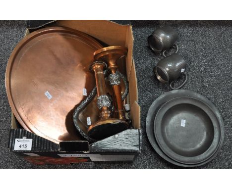Box of metalware to include: two unusual copper and lead candlesticks, a pair of beaten pewter mugs, three pewter plates, cop