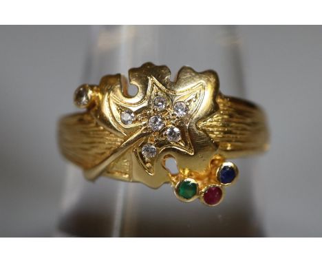 18ct gold vine leaf design ring set with sapphire, ruby, emerald and white stones. Ring size P. Approx weight 3 grams. (B.P. 