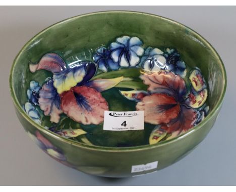 Moorcroft art pottery tube lined cream ground floral footed bowl, 19cm diameter approx. (B.P. 21% + VAT)No obvious damage but