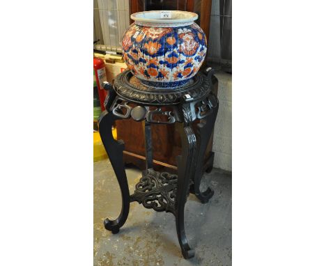 Chinese hardwood carved, marble top jardiniere with under tier, together with a Japanese Imari fluted jardiniere. (2) (B.P. 2