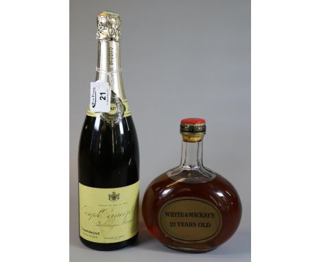 Joseph Perrier bottle of Cuvee Royale champagne, together with a Whyte & Mackay's 21 years old Scotch whisky in original box.