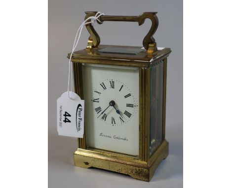 French gilt brass carriage clock with full depth Roman face marked 'Swansea Goldsmiths'.(B.P. 21% + VAT) Wear to case in plac