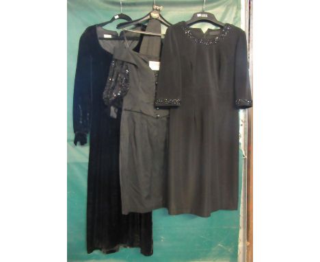 Three vintage dresses to include; one long black velvet with Caroline Charles, London label, one Bellville Sassoon Lorcan Mul