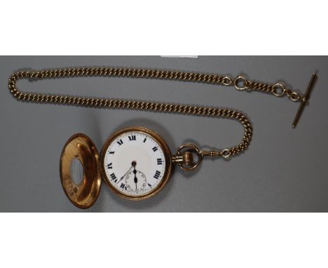 9ct gold half hunter pocket watch. Inner and outer cases all 9ct gold with white enamel face and Roman numerals, together wit