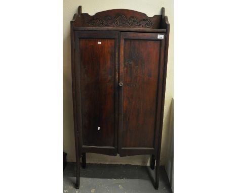 Early 20th century stained oak two-door blind panel folding, three-shelf cabinet.(B.P. 21% + VAT) 