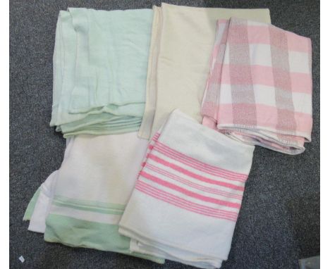 Collection of vintage woollen blankets to include; plain undyed, plain light green, one with green stripe at end, pink stripe