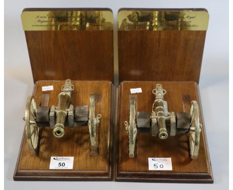 Pair of brass mounted wooden bookends each having a brass scale model of a 9 pound field piece Royal Regiment of Artillery 18