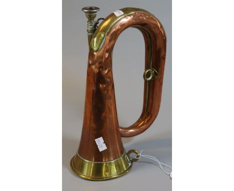 British copper and brass regimental bugle marked 'Maker to H.M. Forces A.Hall, Gisborne, Birmingham, England' with no. 3129.(