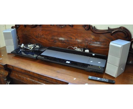Bang & Olufsen stereo system with speakers and remote. (B.P. 21% + VAT) Beocenter 8500, type 2511Beogram 8500, type 5971Has "