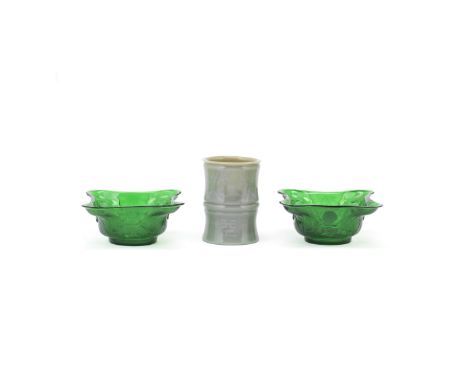 A GROUP OF GLASS VESSELSLate Qing DynastyComprising: a pair of translucent emerald green glass quadrilobed bowls in the form 