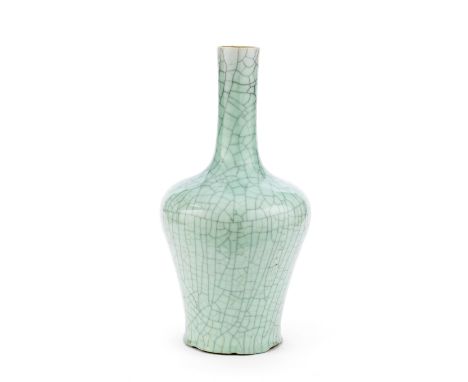 A CRACKLE-GLAZED BOTTLE VASE19th centuryModelled with a slender body rising to a broad rounded shoulder thinning into a cylin