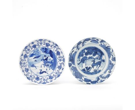 TWO BLUE AND WHITE 'HUNTING' AND 'DEER' DISHESWanli and Kangxi, Chenghua markThe first one with a central reserved hunting sc