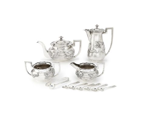 A FOUR-PIECE SILVER TEA AND COFFEE SERVICEby Zee Wo, late 19th centuryComprising: a coffee pot, a teapot, a creamer, a two-ha