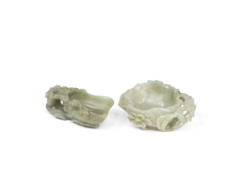 TWO PALE GREEN JADE BRUSH WASHERS19th centuryThe first of blossom form with entwined decoration of prunus branches in relief,
