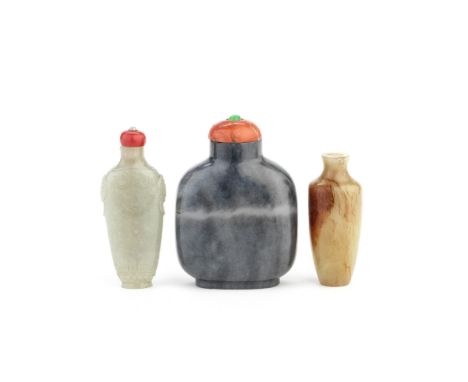 THREE JADE SNUFF BOTTLES19th centuryComprising: a green jade square snuff bottle, coral stopper; a yellow and russet jade snu
