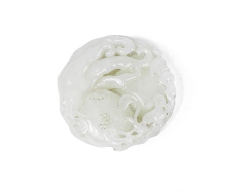 A WHITE JADE CARVING OF AUSPICIOUS FRUITS20th centuryOf circular shape representing a finger citron fruit, a pomegranate, a p