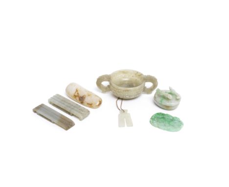 A GROUP OF SEVEN JADE AND JADEITE OBJECTSThe cup, 16th/17th century; the other pieces, 18th/19th centuryComprising: a pale gr
