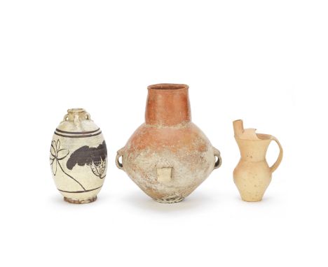 A GROUP OF THREE POTTERY WARESNeolithic period and Ming DynastyThe large red pottery jar with four lug handles to the rounded